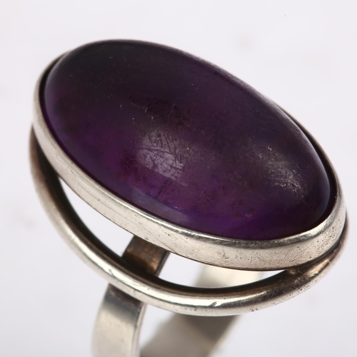 1458 - NIELS ERIK FROM - a Danish modernist sterling silver and amethyst dress ring, setting height 26.7mm,... 