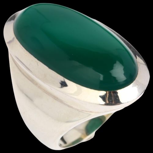 A large sterling silver green chalcedony dress ring, rub-over set with ...