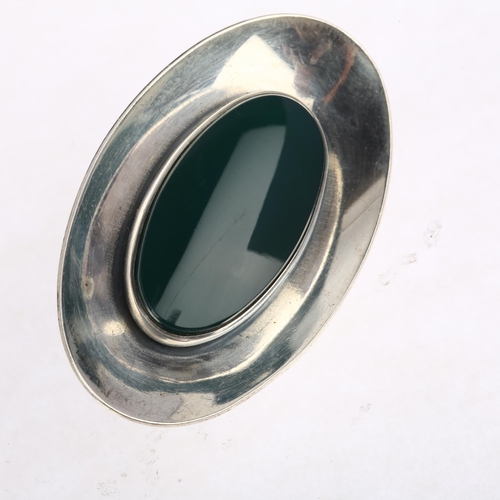 1469 - NIELS ERIK FROM - a Danish modernist sterling silver and green agate concave disc brooch, 43.6mm, 12... 