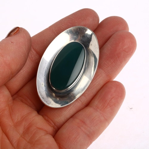 1469 - NIELS ERIK FROM - a Danish modernist sterling silver and green agate concave disc brooch, 43.6mm, 12... 