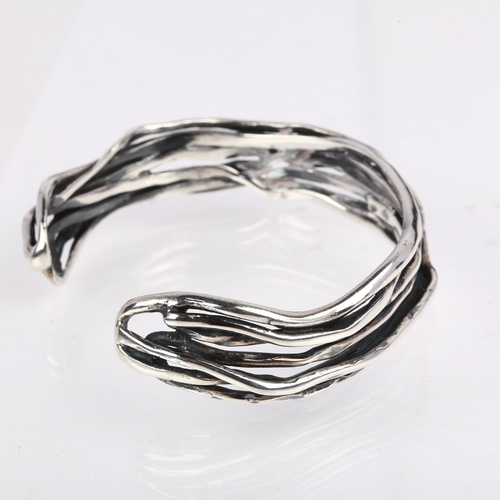 1479 - JENS JOHS AAGAARD - a Danish brutalist sterling silver wirework torque bangle, band width 14.1mm, in... 