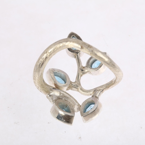 1485 - A large sterling silver blue topaz naturalistic branch dress ring, rub-over set with pear-cut topaz ... 