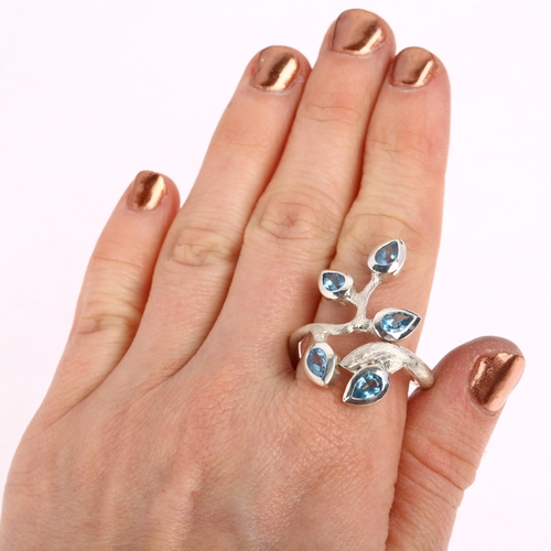 1485 - A large sterling silver blue topaz naturalistic branch dress ring, rub-over set with pear-cut topaz ... 