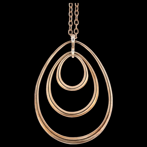 1492 - DINNY HALL - a large designer sterling silver-gilt concentric hoop pendant necklace, on original ste... 