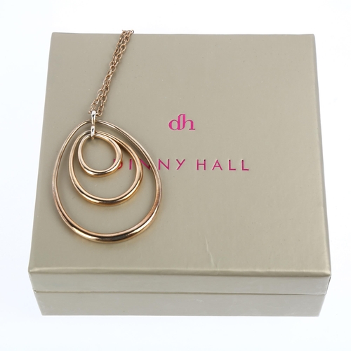 1492 - DINNY HALL - a large designer sterling silver-gilt concentric hoop pendant necklace, on original ste... 