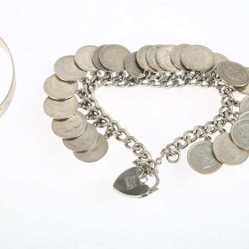 1514 - A sterling silver three pence coin charm bracelet, and a silver slave bangle, 18cm and 21cm, 71.2g t... 