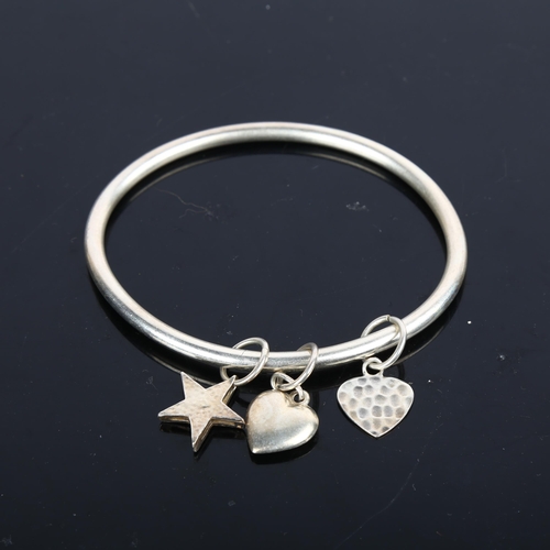 1542 - A modern sterling silver slave bangle, with sliding charms, band width 4mm, internal circumference 1... 