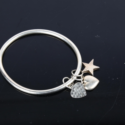 1542 - A modern sterling silver slave bangle, with sliding charms, band width 4mm, internal circumference 1... 