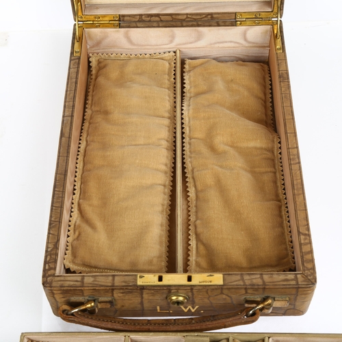 1563 - A good quality early 20th century crocodile-effect leather travelling jewellery box, with removeable... 