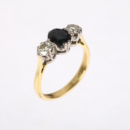 1565 - A late 20th century 18ct gold three stone sapphire and diamond ring, maker EWA, London 1974, claw se... 