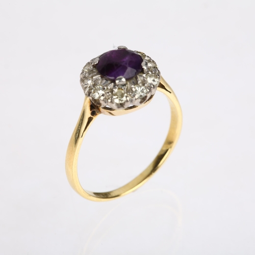 1566 - A mid-20th century 18ct gold amethyst and diamond circular cluster ring, platinum-topped, claw set w... 