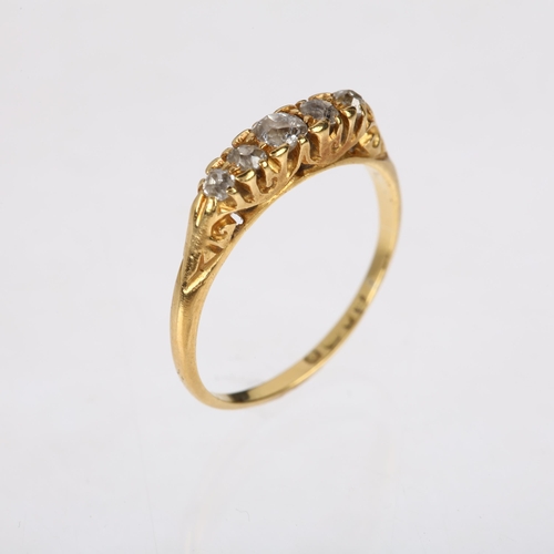 1567 - An early 20th century 18ct gold graduated five stone diamond half hoop ring, London 1918, setting he... 