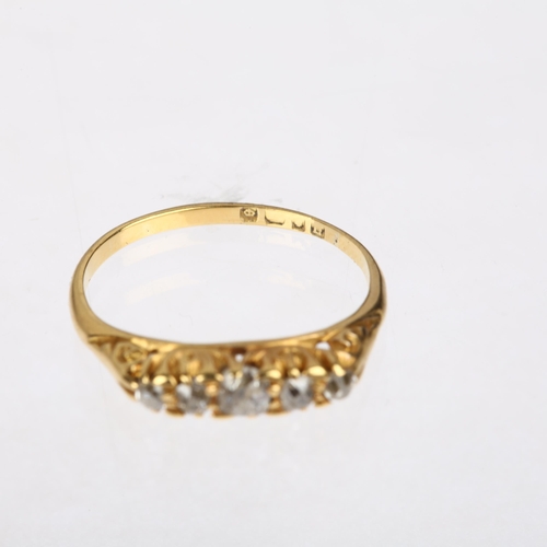 1567 - An early 20th century 18ct gold graduated five stone diamond half hoop ring, London 1918, setting he... 