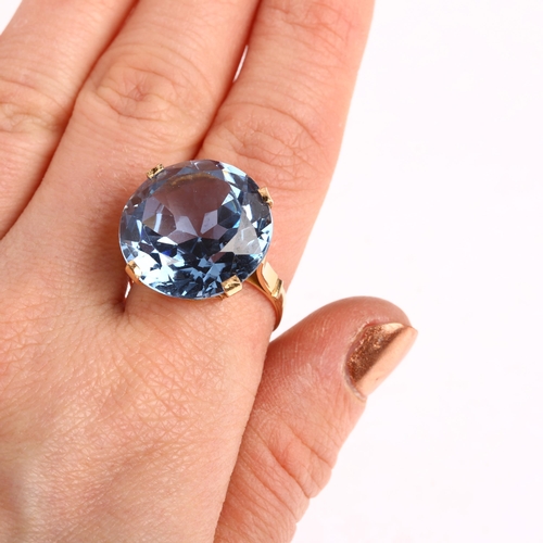 1575 - A large Middle Eastern blue synthetic spinel dress ring, pierced gold setting with large round-cut s... 