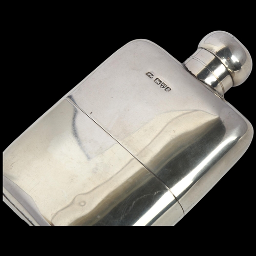 1613 - An Edwardian silver curved hip flask, William Neale, Chester 1905, with bayonet lock, button cap and... 