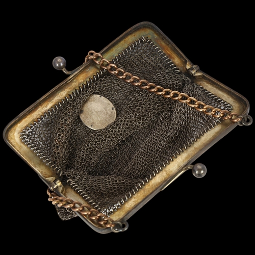 1614 - A French silver chainmail evening bag, with unmarked yellow metal curb link chain handle and applied... 