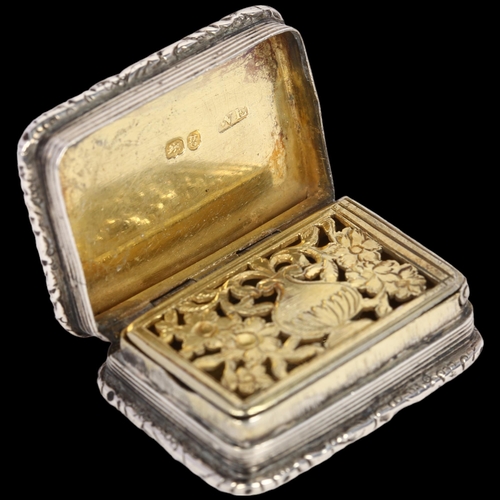 1615 - A George IV silver vinaigrette, probably William Edwards, London 1822, rectangular form with cast fl... 