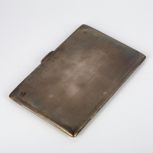 1625 - A George V rectangular silver cigarette case, Dudley Russell Howitt, Birmingham 1920, allover engine... 