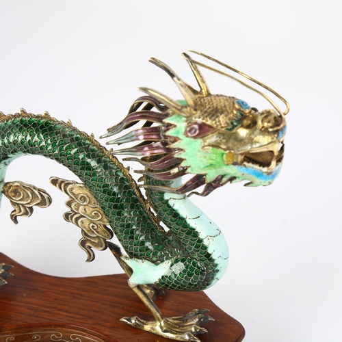 1629 - A Chinese silver-gilt cloisonne enamel dragon figure, realistically modelled with auspicious cloud w... 