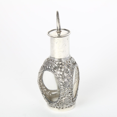 1637 - A Chinese sterling silver-mounted glass dimple scent flask, Hong Kong, maker KH, pierced dragon deco... 