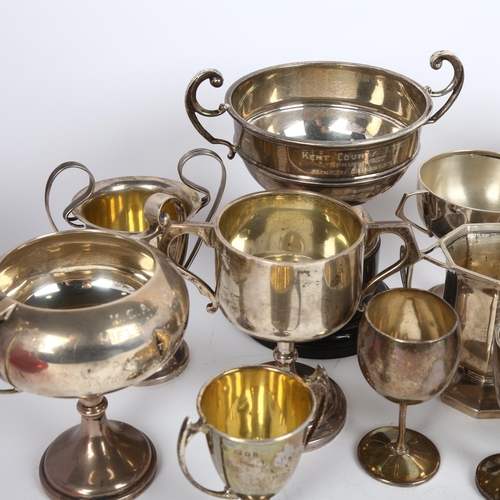 1642 - A quantity of silver trophy cups, 26oz weighable