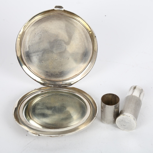 1646 - A George VI circular silver compact, maker FLR, Birmingham 1946, 7.5cm, 3.4oz gross, and a silver pl... 