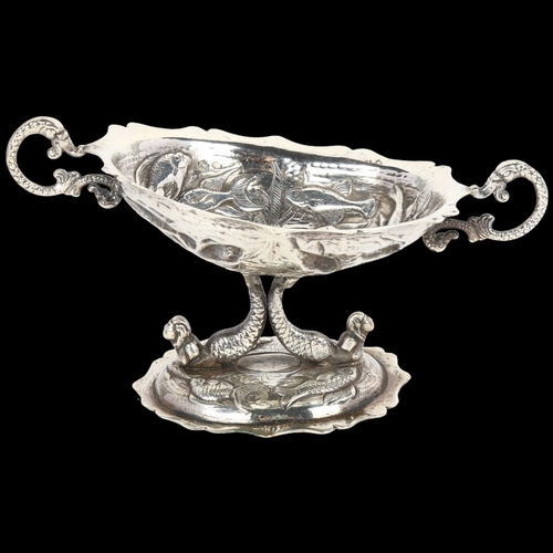 1657 - A 19th century Spanish silver pedestal table salt, with relief embossed fish decoration and mermaid ... 