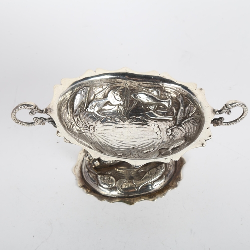 1657 - A 19th century Spanish silver pedestal table salt, with relief embossed fish decoration and mermaid ... 