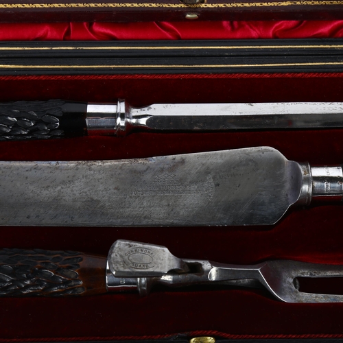 1658 - A George V silver-mounted horn carving set, Thomas Turner & Co, Sheffield 1912, and another cased si... 