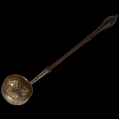 1665 - A Georgian silver toddy ladle, with inset 1711 coin base and turned wood handle, length 30cm