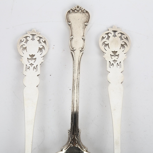 1670 - A pair of Edwardian silver decorative serving spoons, Allen & Darwin, Sheffield 1908, and a silver s... 