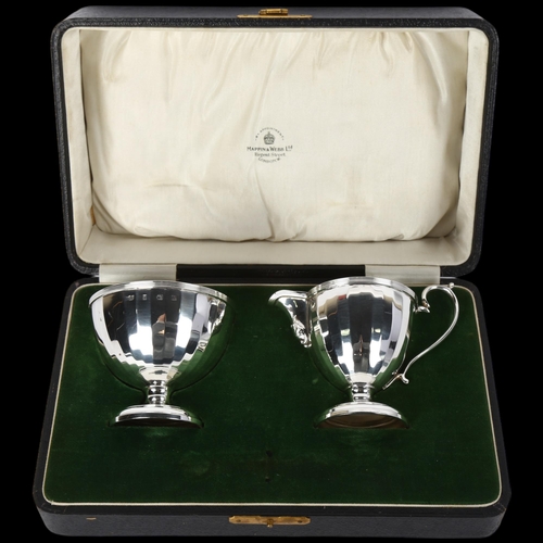 1692 - A George V silver sugar bowl and cream jug set, Mappin & Webb, Birmingham 1925, circular faceted for... 