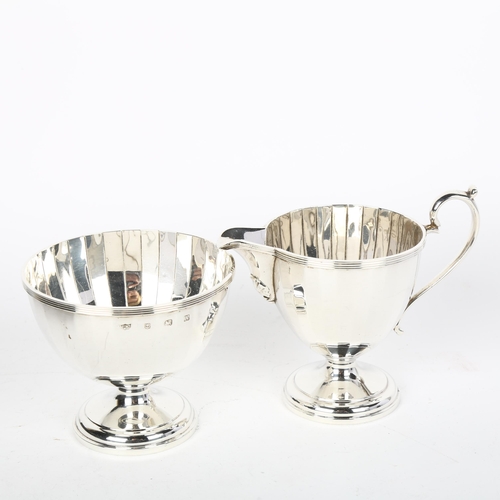 1692 - A George V silver sugar bowl and cream jug set, Mappin & Webb, Birmingham 1925, circular faceted for... 