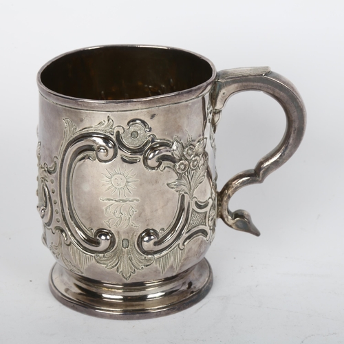 1702 - A George I silver pint mug, indistinct maker, London 1721, cylindrical form with folded foot, gilt i... 