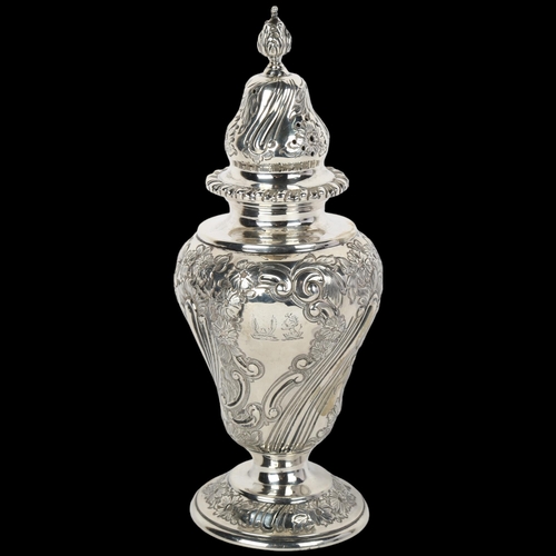 1703 - An Edwardian silver sugar shaker, Goldsmiths & Silversmiths Co Ltd, London 1904, baluster form with ... 