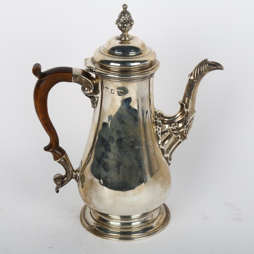 1704 - A George II silver coffee pot, probably Francis Crump, London 1756, baluster form with pineapple fin... 