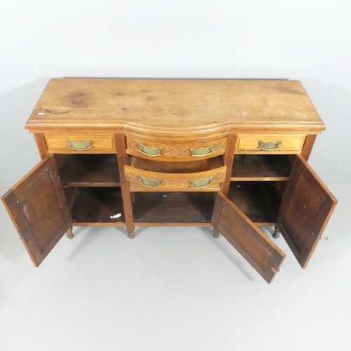 2134 - A mahogany Art Nouveau style sideboard, with four drawers, three cupboards and carved foliate decora... 