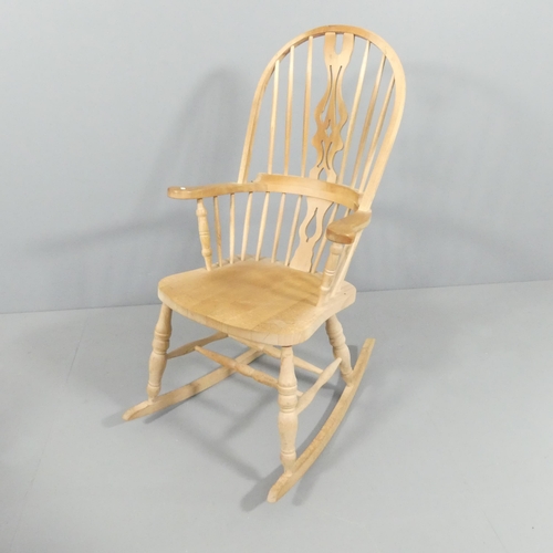 2153 - A modern pine Windsor rocking chair.