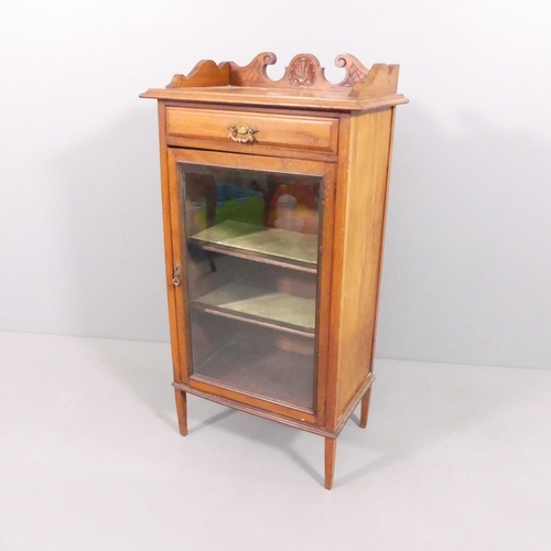 2156 - An antique mahogany music cabinet, with single drawer above glazed door. 58x111x36cm.