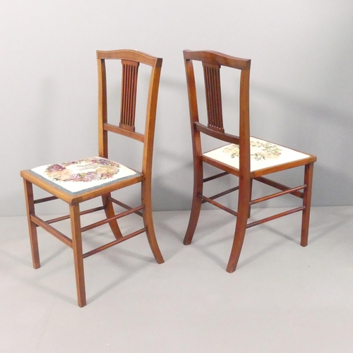 2172 - A pair of Edwardian mahogany and satinwood strung side chairs, with needlepoint upholstered seats an... 