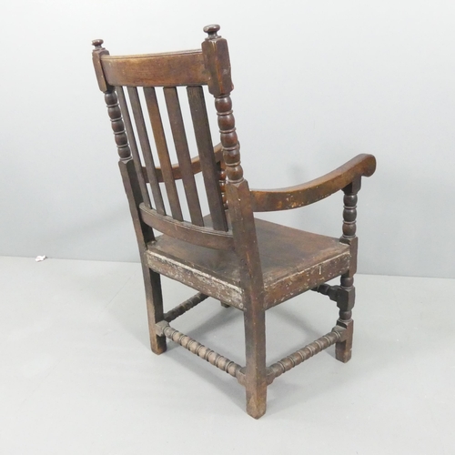 2191 - A 19th century oak open armchair, with bobbin turned supports.