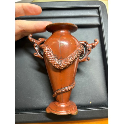 236 - A Japanese red/brown patinated bronze miniature vase, with entwined serpent body, height 11cm