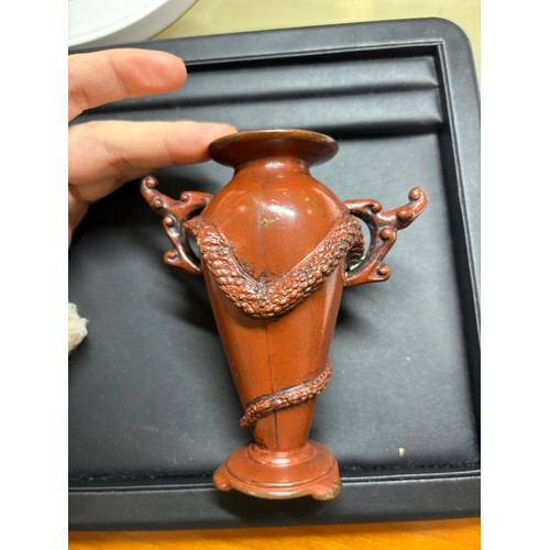 236 - A Japanese red/brown patinated bronze miniature vase, with entwined serpent body, height 11cm