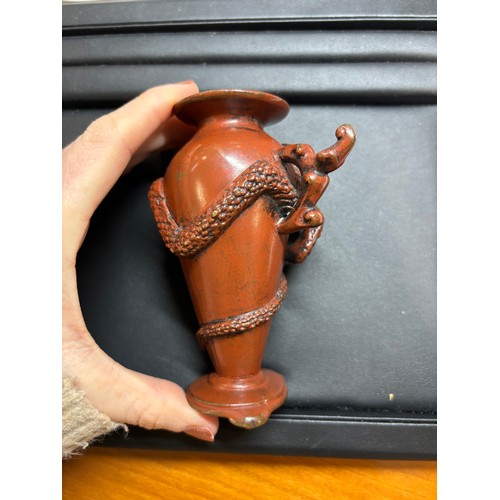 236 - A Japanese red/brown patinated bronze miniature vase, with entwined serpent body, height 11cm