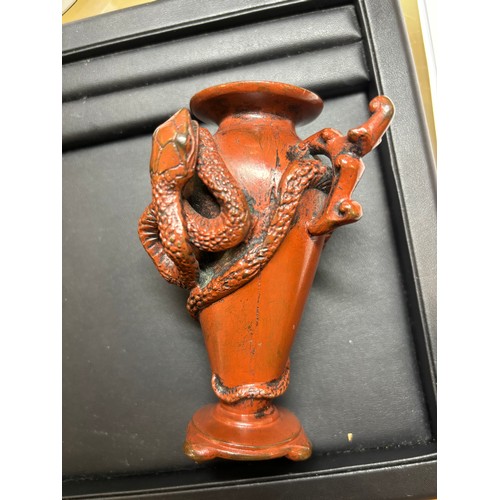 236 - A Japanese red/brown patinated bronze miniature vase, with entwined serpent body, height 11cm