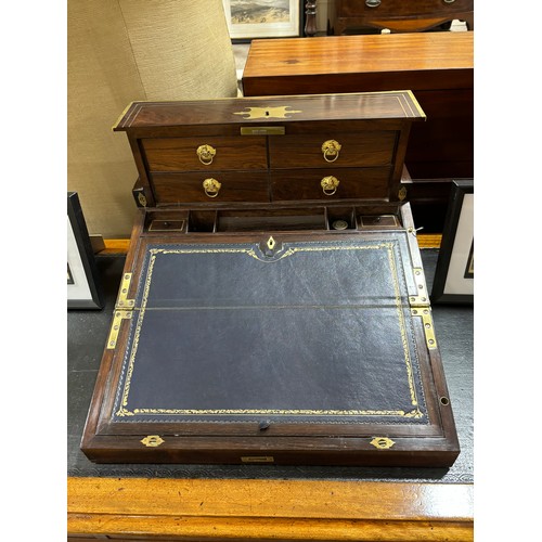 92 - An unusual 19th century brass-bound rosewood campaign travelling writing box, with rising drawer-fit... 