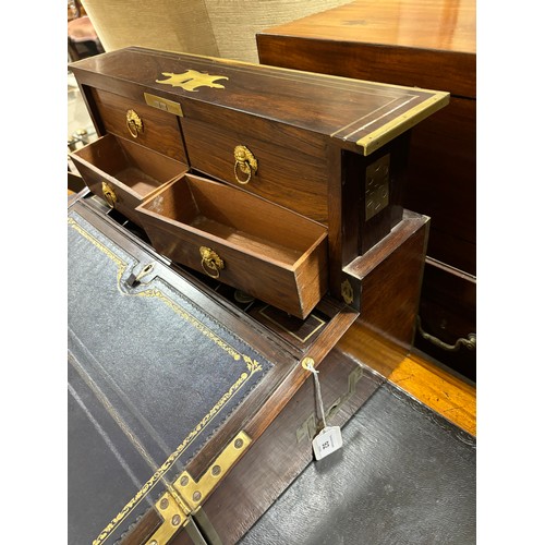 92 - An unusual 19th century brass-bound rosewood campaign travelling writing box, with rising drawer-fit... 