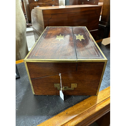 92 - An unusual 19th century brass-bound rosewood campaign travelling writing box, with rising drawer-fit... 