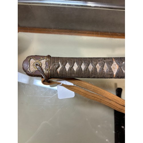 177 - Japanese early 20th century sword, with shagreen and bound handle with parcel-gilt mounts, blade len... 