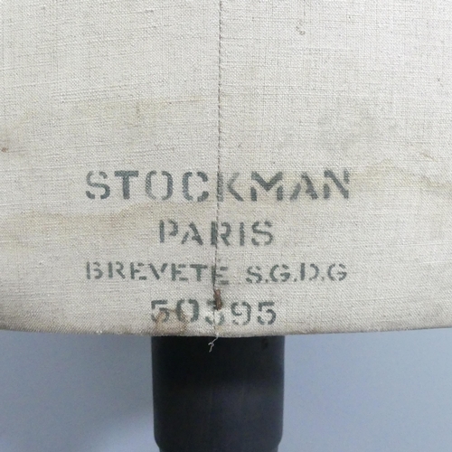 2048 - A Stockman's dressmaker's mannequin on ebonised tripod stand. Height 161cm.